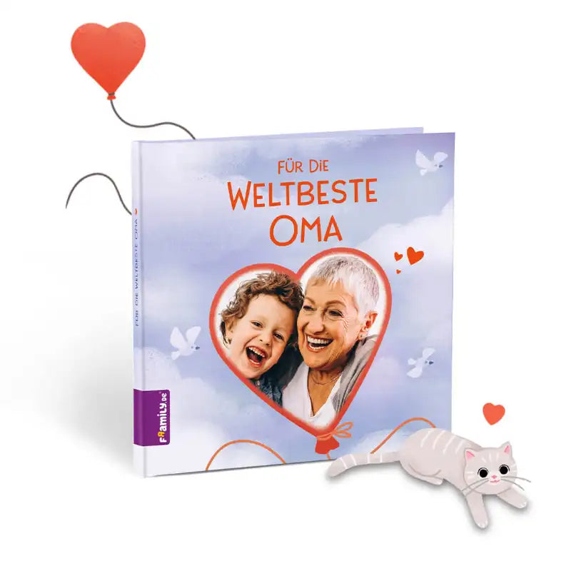 Das Kinderbuch "Für die weltbeste Oma" von Framily zeigt eine lächelnde ältere Frau und ein Kind in einem Herz, mit einer Zeichentrickkatze und einem roten Herzluftballon - ein einzigartiges Geschenk für Oma.